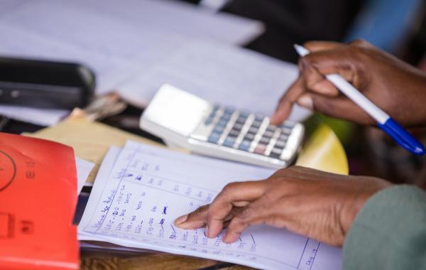 Managing money with maths and calculator