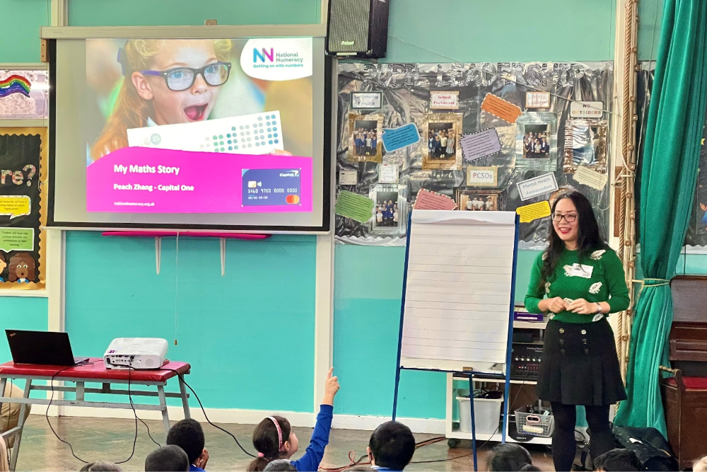 Volunteer leading an assembly