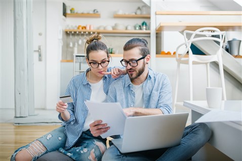 couple looking at a bill