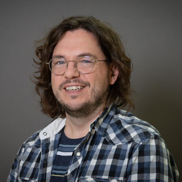 Headshot of Thomas K Briggs