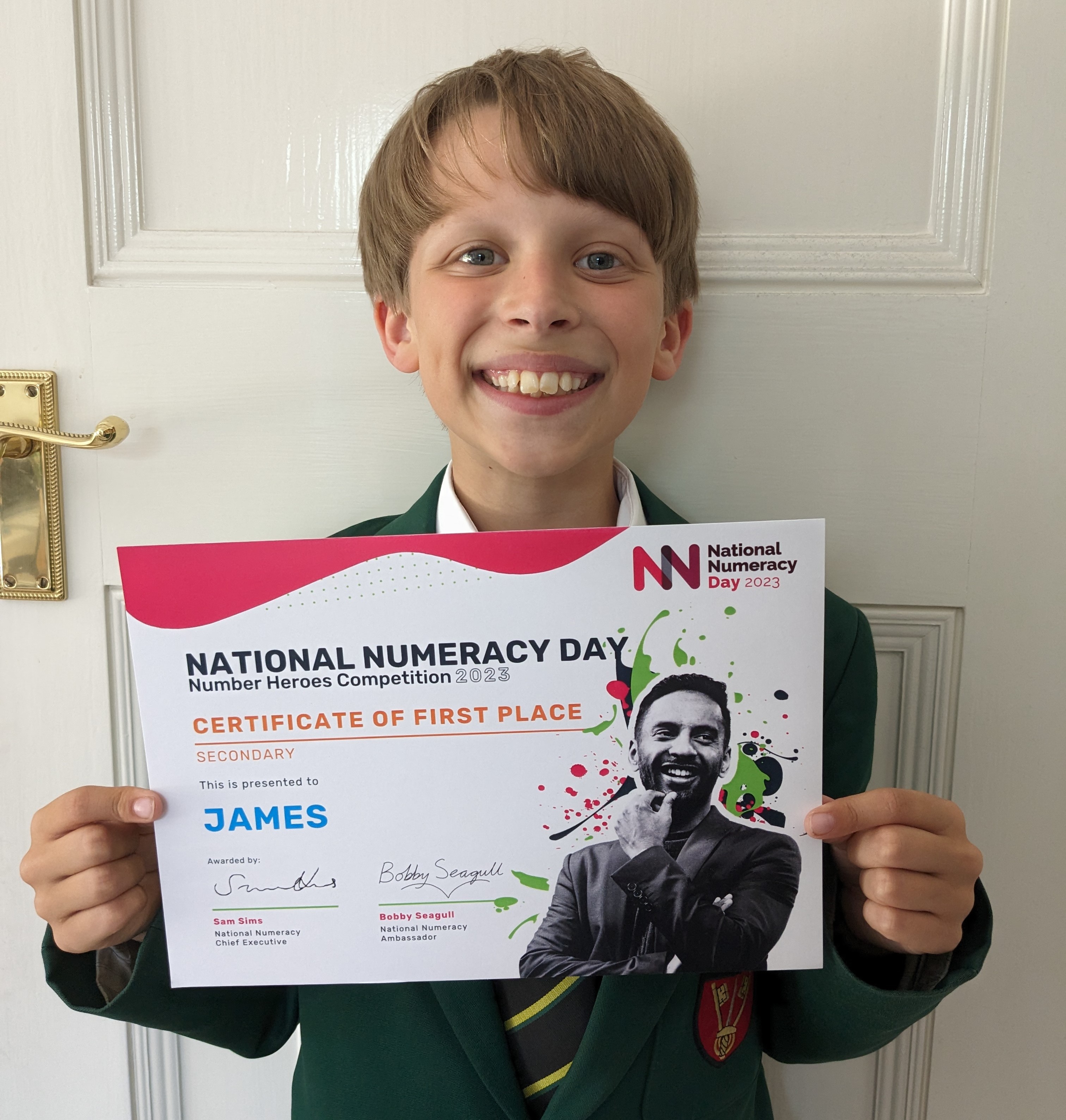One of the 2023 winners, James, with his certificate