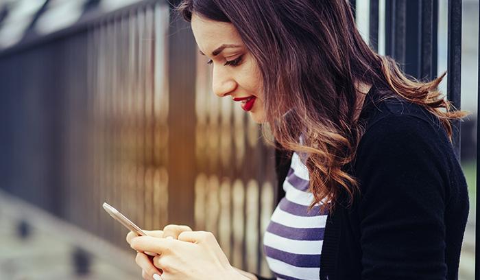 Adult woman using a smart phone