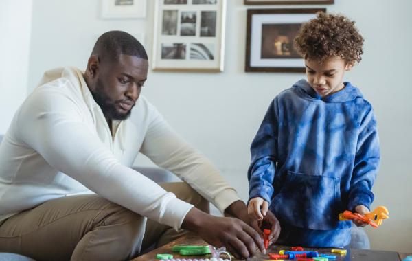 Father and son learning together