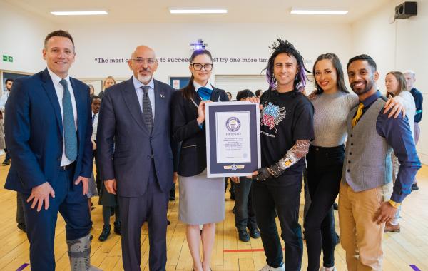 Guinness World Record certificate being handed over