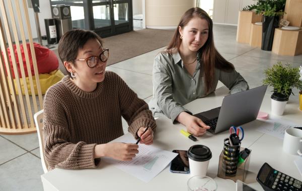 People in an office with laptop