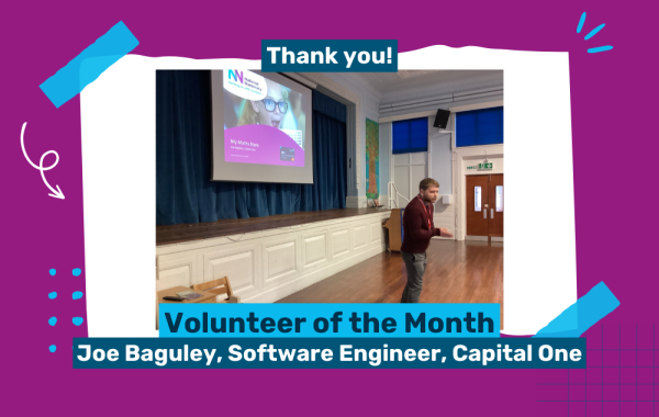 Photo of volunteer, Joe Baguley, giving an assembly at a school