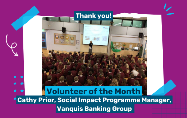 Photo of volunteer, Cathy Prior, giving an assembly at a school