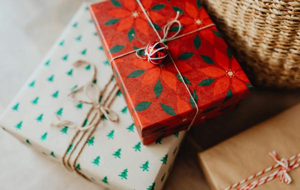 Christmas presents wrapped up with paper and string
