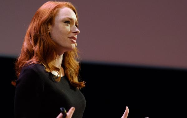 Hannah Fry speaking on stage