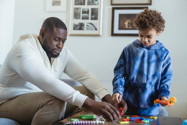 Father and son learning together