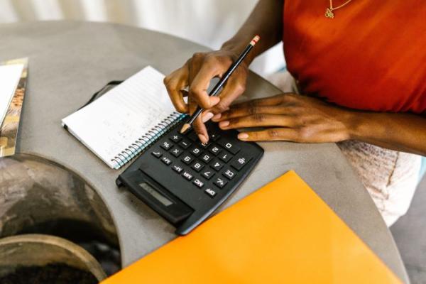 person using a calculator