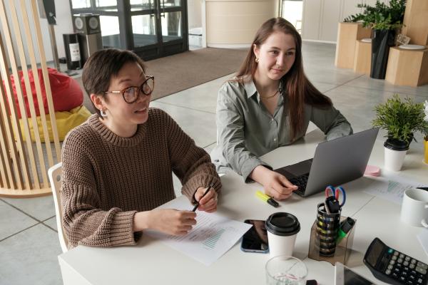 People in an office with laptop