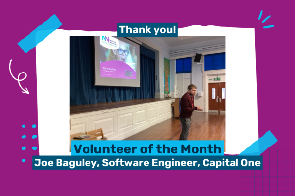 Photo of volunteer, Joe Baguley, giving an assembly at a school