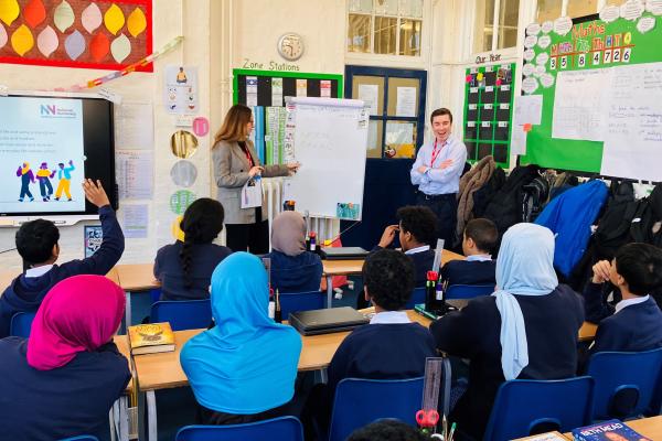 A volunteer leading a class session