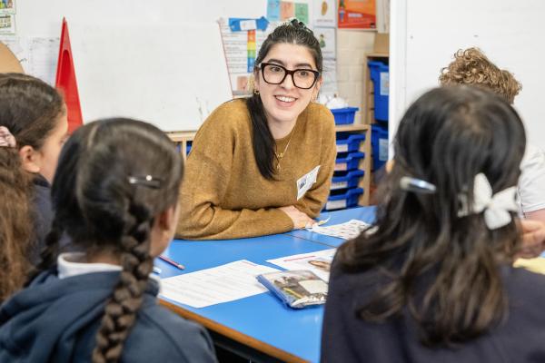 Volunteer with school pupils