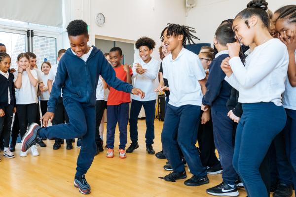 boy dancing at school