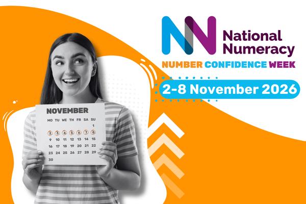 A person smiling and holding a calendar with the dates 2 to 8 November circled, text reads: "National Numeracy Number Confidence Week 2-8 November 2026"