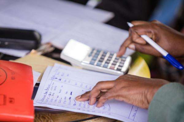 Managing money with maths and calculator